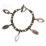 Africa’s “Big Five” on metal and wood beaded bracelet