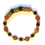 Antique brass feature highlighting sesame jasper, wood and lava stone bracelet
