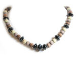 Paper beaded necklace with dye washed wood. Black, dye washed brown, purple and lime green.