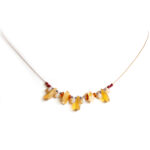 Citrine gemstone chips and golden Czech glass, on bronze nylon coated wire.